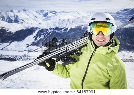 Young successful men ski mountain winter resort