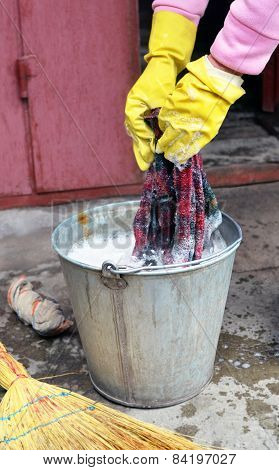 Hands Rinse The Cloth With Soapy Water