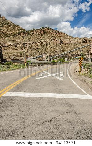 Railroad Crossing Sign On Road