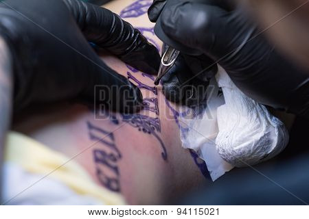 Girl Getting Tattoo