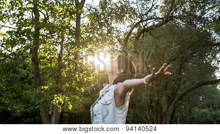 Woman Meditating In Nature