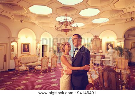 Bride And Groom Dancing In Empty Restaurant
