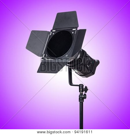 Studio light stand against the gradient