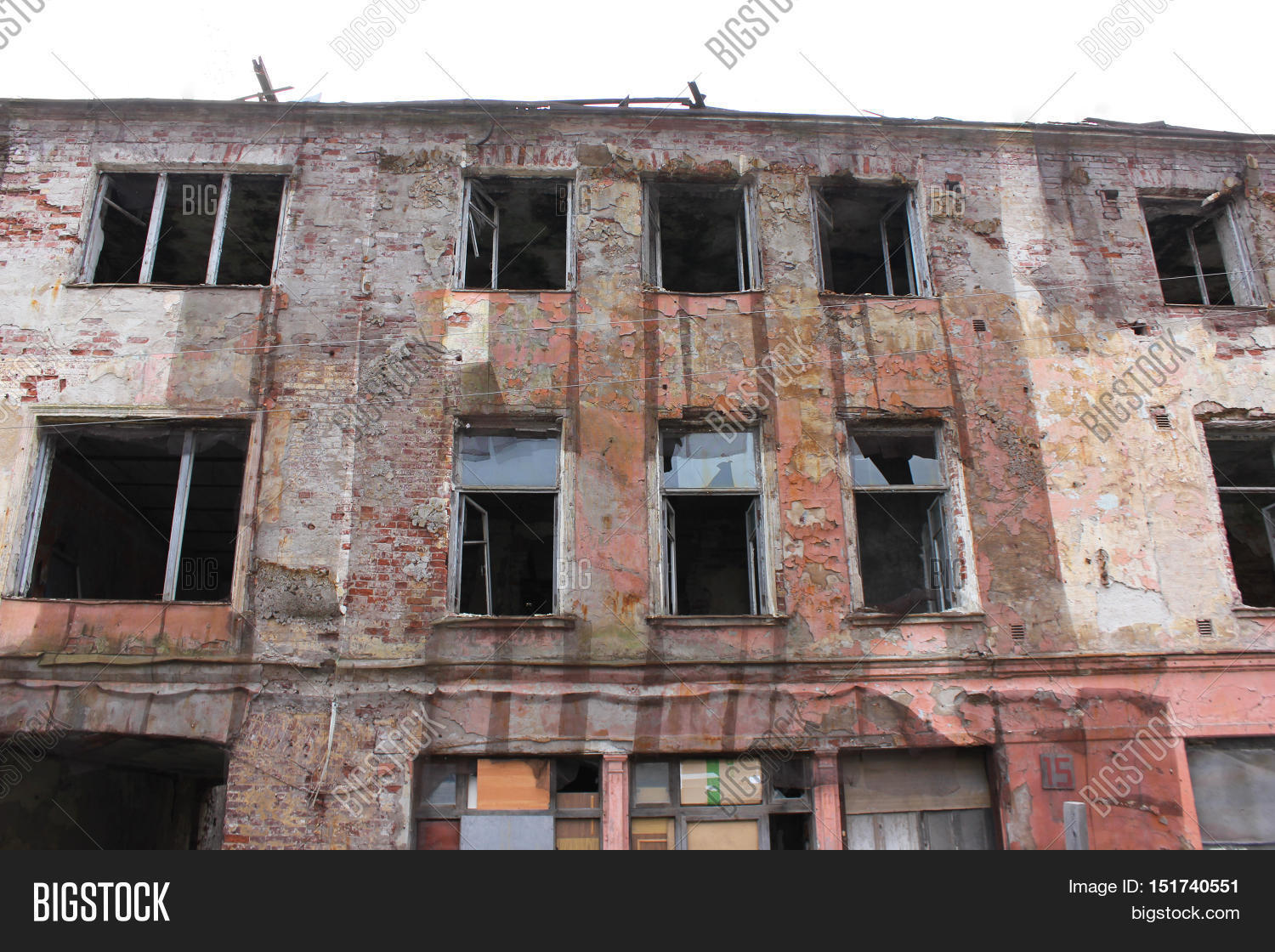 Abandoned Destroyed Damaged Rundown Old Apartment House Building Facade With Broken Glass Windows Renovation Abandoned Destroyed Damaged Rundown Old Apartment House Building Facade With Broken Glass Windows Renovation