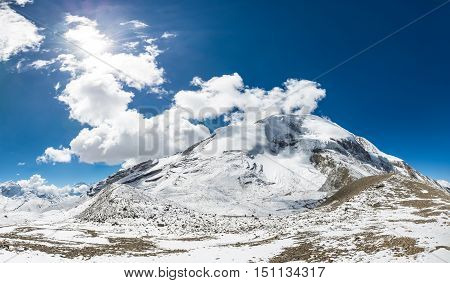 Spectacularo mountain panorama view from Thorong La pass at 5416m. Annapurna circuit trek in Nepal.