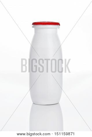 Yogurt container healthy vitamin drink on white background