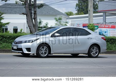 CHIANGMAI THAILAND - OCTOBER 2 2016: Private car Toyota Corolla Altis. On road no.1001 North of city about 8 km from Chiangmai Center.