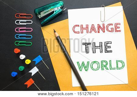 ext Change the world on white paper background