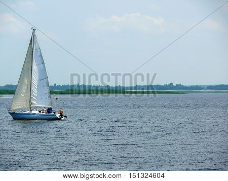a Sailingboat on a lake at sunny day Ukraine