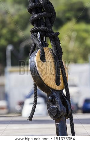 Cagliari: detail of a sailboat anchored in the harbor of Marina Piccola - Sardinia