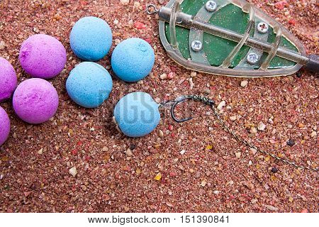 Dry Feed For Carp Fishing As Background. Ready For Use Carp Bait With Fishing Flat Feeder For Carp F
