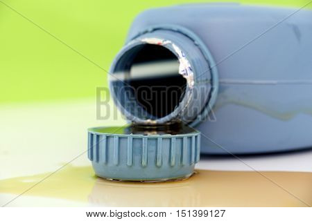 picture of a motor oil bottlecap shot in a studio
