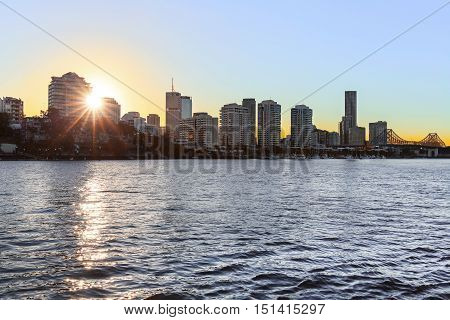 Brisbane Cityscape and Story Bridge sunset, viewed from the back of a CityCat ferry.
