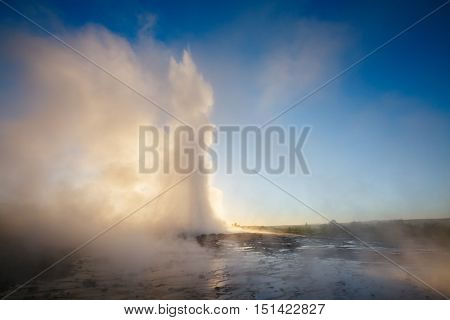 Great view of Strokkur geyser in morning light. Popular tourist attraction. Unusual and gorgeous scene. Location place Geyser Park, Hvita river, Haukadalur valley area, Iceland. Europe. Beauty world.