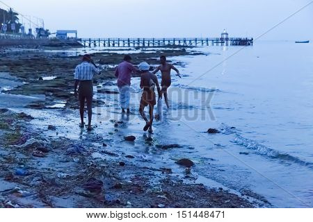 Rameswaram, Tamil Nadu, India - May 25, 2014. Full report about Rameswaram pilgrimage, religion. Religious city rituals. Bath in sea before going temple