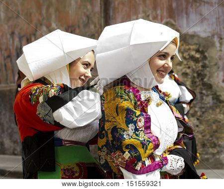 CAGLIARI, ITALY - May 1, 2014: 358 ^ Religious Procession of Sant'Efisio - Sardinia - group of beautiful girls in traditional Sardinian costume