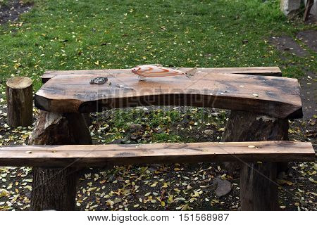Kitschy Glass Fish On A Wooden Table