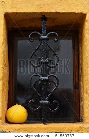Ornamental Forged Metal Lattice On A Basement Window