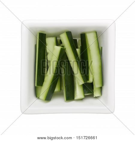 Japanese cucumber sticks in a square bowl isolated on white background
