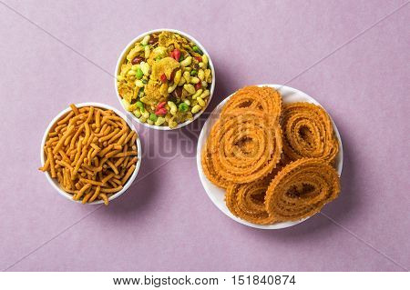 Indian Snack : Chakli, chakali or Murukku and Besan (Gram flour) Sev and chivada or chiwada. Diwali Food