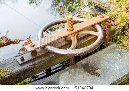 Iron controlling wheel for penstock water control.