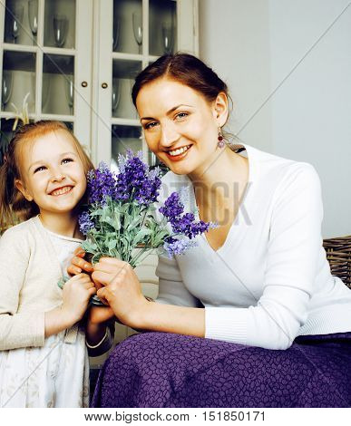 young mother with daughter at luxury home interior vintage, old fashion relashionship family