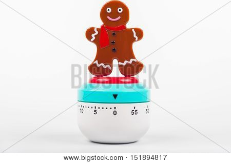 Cooking timer gingerman on a white background