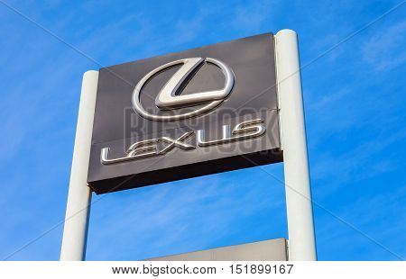 SAMARA RUSSIA - MAY 11 2016: Lexus automotive dealership sign against the blue sky background. Lexus is the luxury vehicle division of Japanese automaker Toyota Motor Corporation