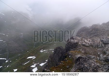 This aerial view of the valley Geyragen with clouds shrouded the top of Mount Dalsnibba Norway