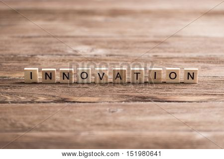 Concept of innovation made of wooden elements with the letters
