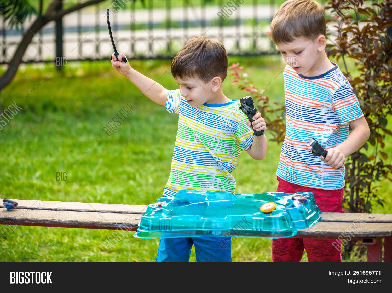 Two Boys Playing Top, Image & Photo (Free Trial) | Bigstock