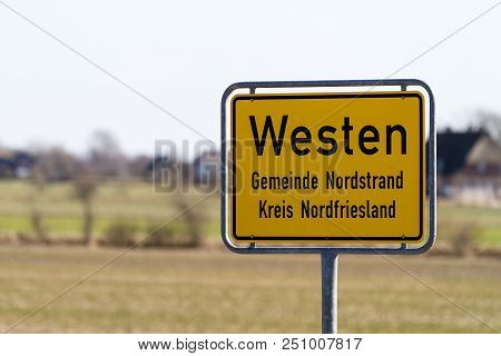 Yellow Sign In Front Of The Village Westen Near Husum, Schleswig-holstein, Germany