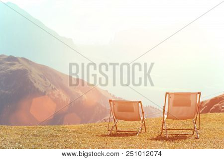 Two Chairs In The Mountains