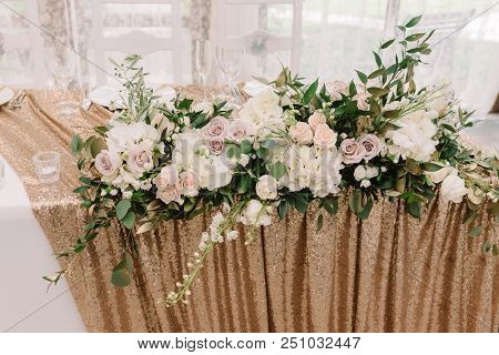 Beautiful Pink And Lilac Roses And White Hydrangea On A Wedding Table. Stylish Details Of Decoration