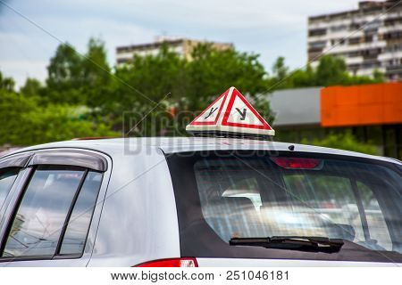 Russian Driving School Sign On Car Roof