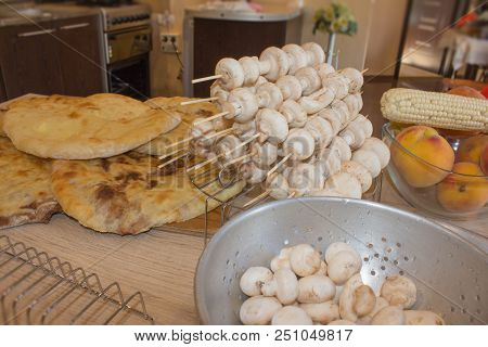 Georgian Bean Pie Lobiani On The Table. Caucasus National Cuisine. Food Background. Peach, Corn And 
