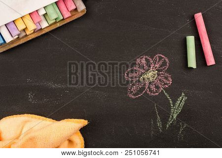 Box Of Chalk Multicolored Colorful Crayons Lie On Black Chalkboard Concept Kid Background For Write