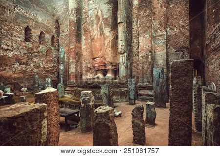 Ancient City Polonnaruwa And Feet Of Buddha Inside Stome Temple. Buddhist Structure Of 12th Century,