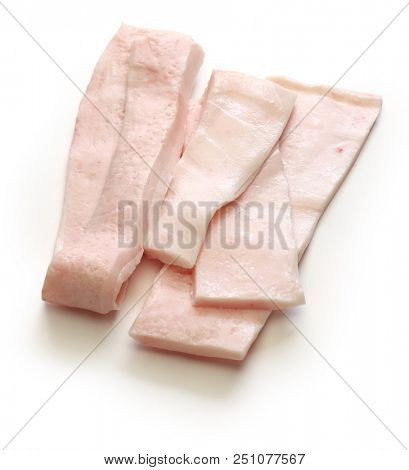 raw fatback, pig fat isolated on white background