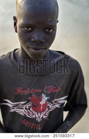 Orango Island, Guinea-bissau - February 2, 2018:  Portrait Of A Young African Boy At The Beach In Th