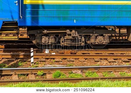 Wheel Of A Modern Passenger Car Of A Train, Wheels Of A Train On Rails