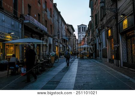Ferrara, Italy - July, 23, 2018: street in the historical center of Ferrara at a night