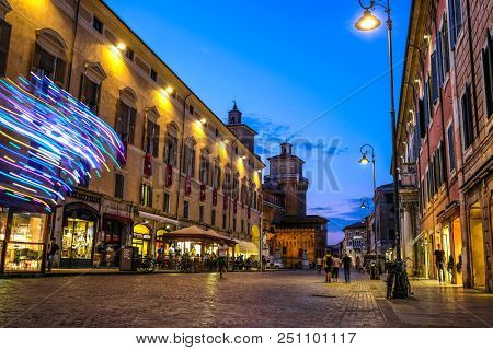 Ferrara, Italy - July, 23, 2018: street in the historical center of Ferrara at a night