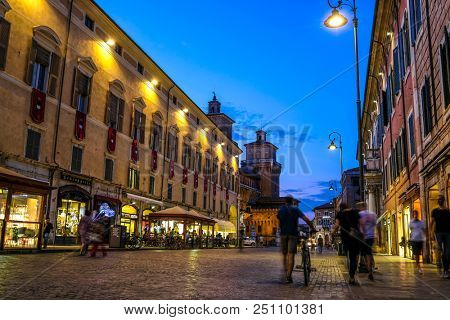 Ferrara, Italy - July, 23, 2018: street in the historical center of Ferrara at a night