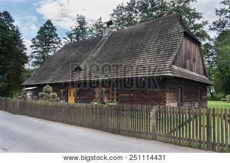 An Antique Wooden Cottage With A Log Construction Without Remnants From 1831. Village Kielcza, Opole