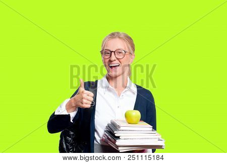 Happy Young Student Girl Holding Books, High School Or College Graduand On Colored Background. Back 