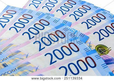 Russian Cash. Denominations Of 2000 Rubles Was Lying On A White