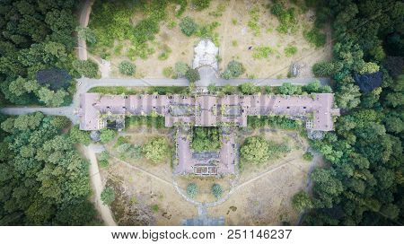 Birds Eye, Top View Of Old Abandoned Stonebuilt Building In Deep Forest
