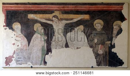 MANTUA, ITALY - JUNE 04: Crucifixion, old fresco painting in Saint Francis church in Mantua, Italy on June 04, 2017.