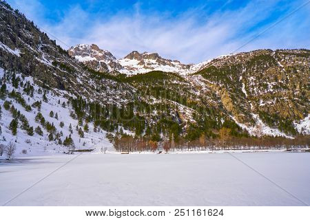 Panticosa snow frozen lake ice in Huesca Pyrenees of Spain